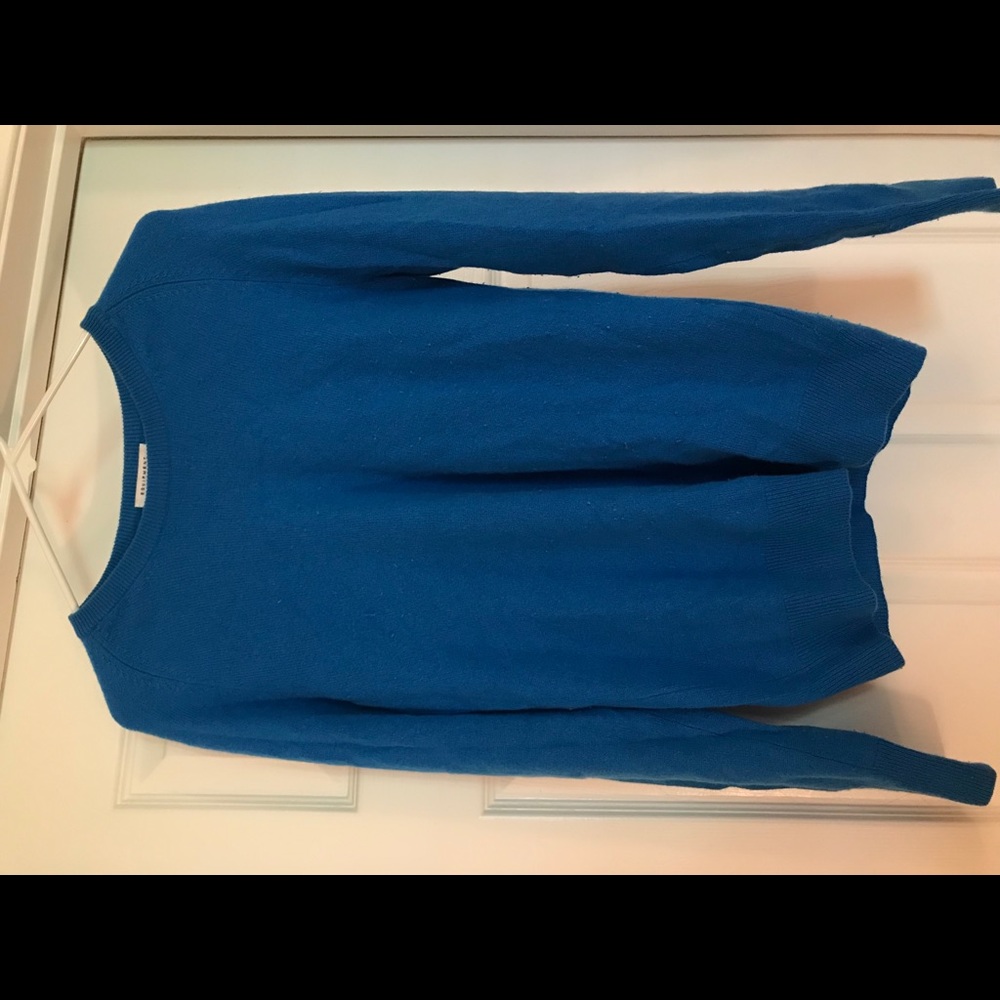 Woman’s Blue Sweater